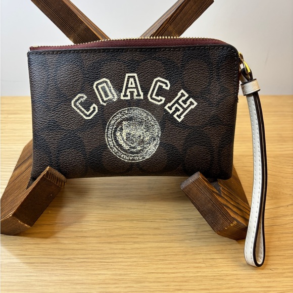 Coach Handbags - Coach Signature Corner Zip Brown Wristlet Bag “As Is”